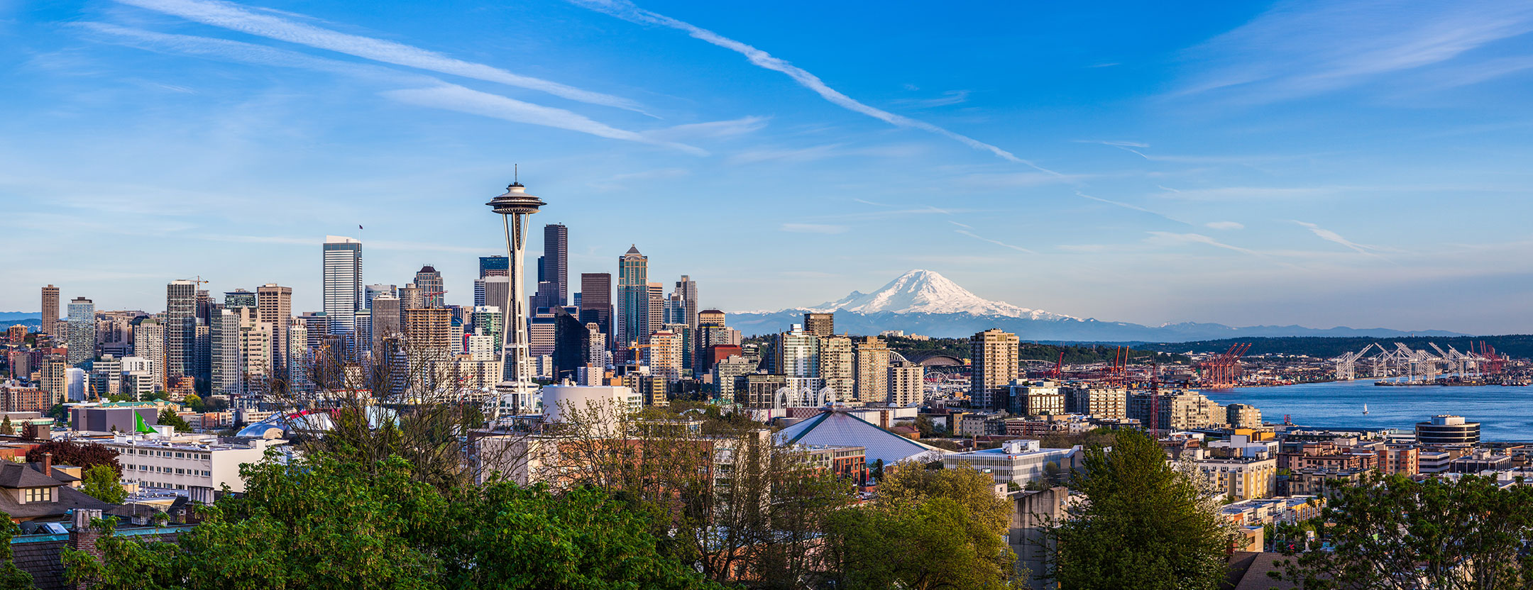 Seattle skyline and Mount Rainier image from the local asset set.